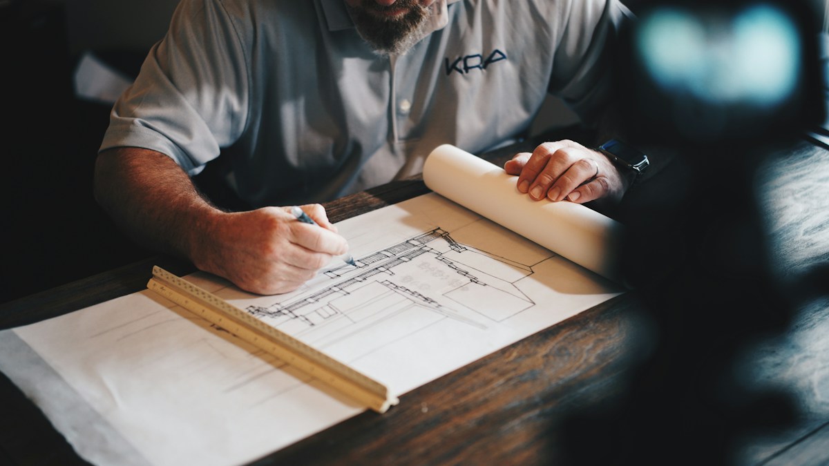 Architectural drafting plan prepared on a drawing desk